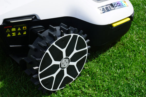 Mammotion Yuka mini robotic lawnmower Performance Spikes Traction Odometry white