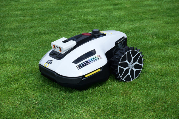 Mammotion Yuka mini robotic lawnmower Performance Spikes Traction Odometry white